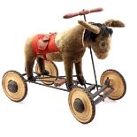Toy donkey on wheels
