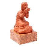 Terra cotta figurine of a girl