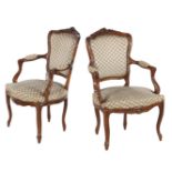 2 walnut Louis Quinze armchairs with polychrome upholstery and beautiful stitchwork