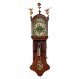Frisian tail clock in oak case with figurines on the hood