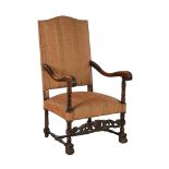 Richly decorated oak armchair with striped upholstery
