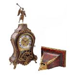Neuchatel console clock with a trumpet-blowing angel on top