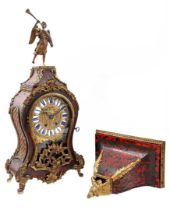 Neuchatel console clock with a trumpet-blowing angel on top