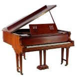 L Schmidt Berlin baby grand piano in walnut veneer cabinet