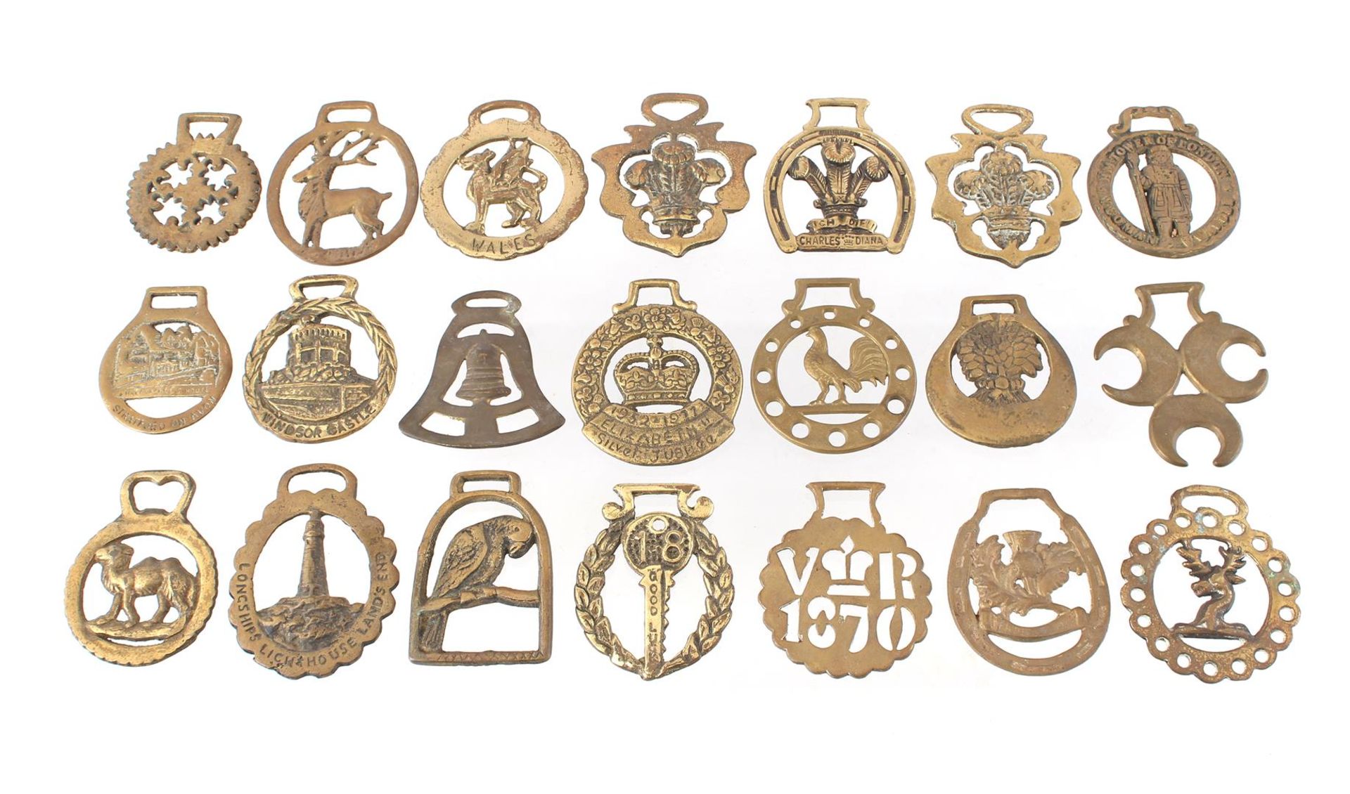 Various ornamental plates of a horse collar