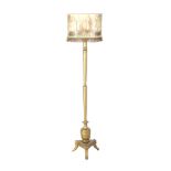 Classic wooden gold-colored floor lamp with upholstered shade