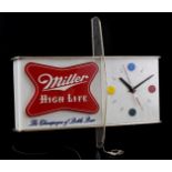 Miller High Life advertisement with clock and lighting