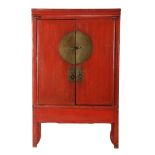 Red and brown stained wooden bridal cabinet with brass accents
