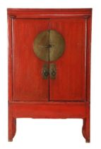 Red and brown stained wooden bridal cabinet with brass accents