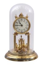 Brass bell jar clock with glass bell jar