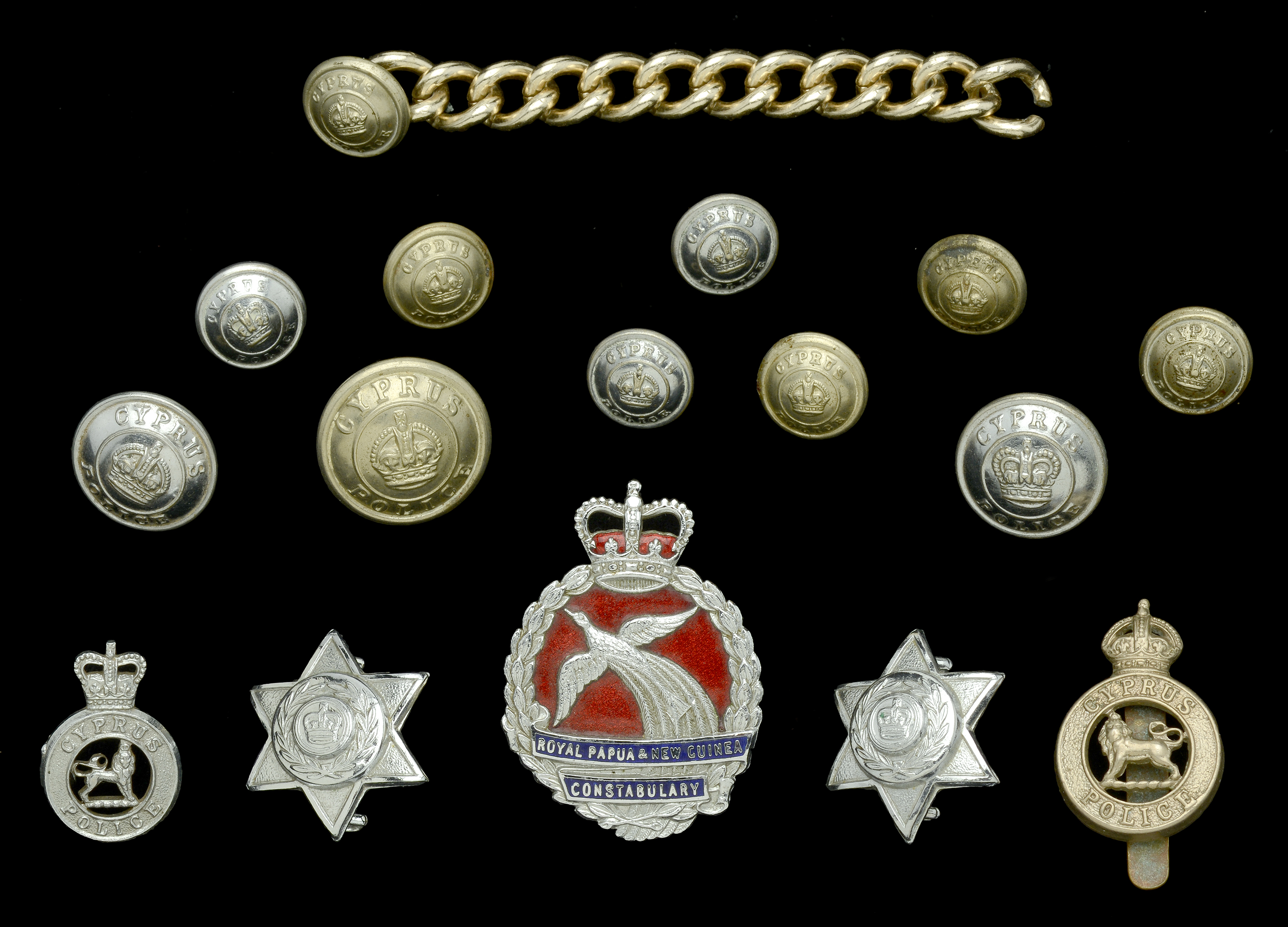 Police Insignia. A selection of Police insignia including Cyprus Police cap and collar badg...