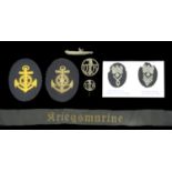 German Second World War Kriegsmarine Insignia. Comprising two naval sleeve badges for a Kri...