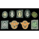 German Second World War Arm Shields. Comprising Edelweiss badge, as removed from a tunic, B...