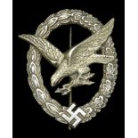 A German Second World War Wireless Operator/ Air Gunner's Badge. A very good example of the...
