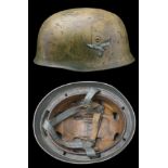 A German Second World War Parachutist's Helmet. A very good example of the fallschirmjager...