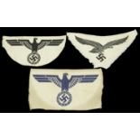 German Second World War Sports Vest Eagles. Three Sports Vest Eagles, comprising full size...