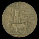 The Memorial Plaque awarded to Private E. G. Tudor, 2nd Battalion, Manchester Regiment, who...