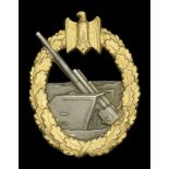 A German Second World War Kriegsmarine Coastal Artillery Badge. Variation 2, by Schwerin, w...