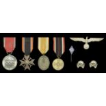 Miscellaneous German Second World War Awards. Comprising a War Merit Medal with its ribbon;...