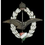 A Hungarian Second World War Observer's Badge. A bronze and enamel badge of multi-piece con...