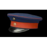 An Imperial German Prussian Officers Peaked Cap. A good example c.1914, blue and red cloth...