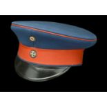 An Imperial German Prussian Officers Peaked Cap. A good example c.1914, blue and red cloth...