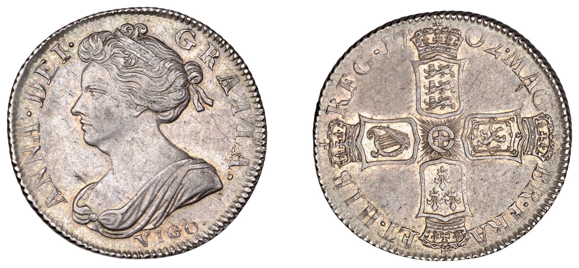 Anne (1702-1714), Shilling, 1702 vigo (ESC 1387; S 3585). About extremely fine, toned Â£600-...
