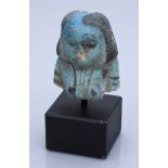 Egypt, Middle Kingdom (c. 2055-1650 BC), Blue faience bound concubine figure, 3.9cm (top hal...