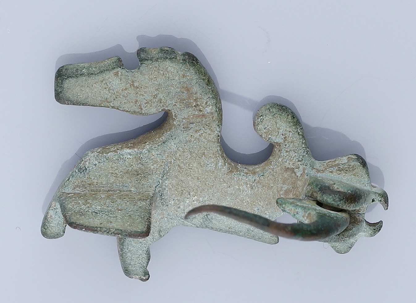 Roman, Romano-British, A bronze Hippocampus plate brooch, 2nd century AD, 28mm long by 20mm... - Image 2 of 2