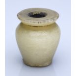 Egypt, Middle Kingdom (c. 2055-1650 BC), 12th Dynasty, calcite alabaster kohl jar; disc-shap...