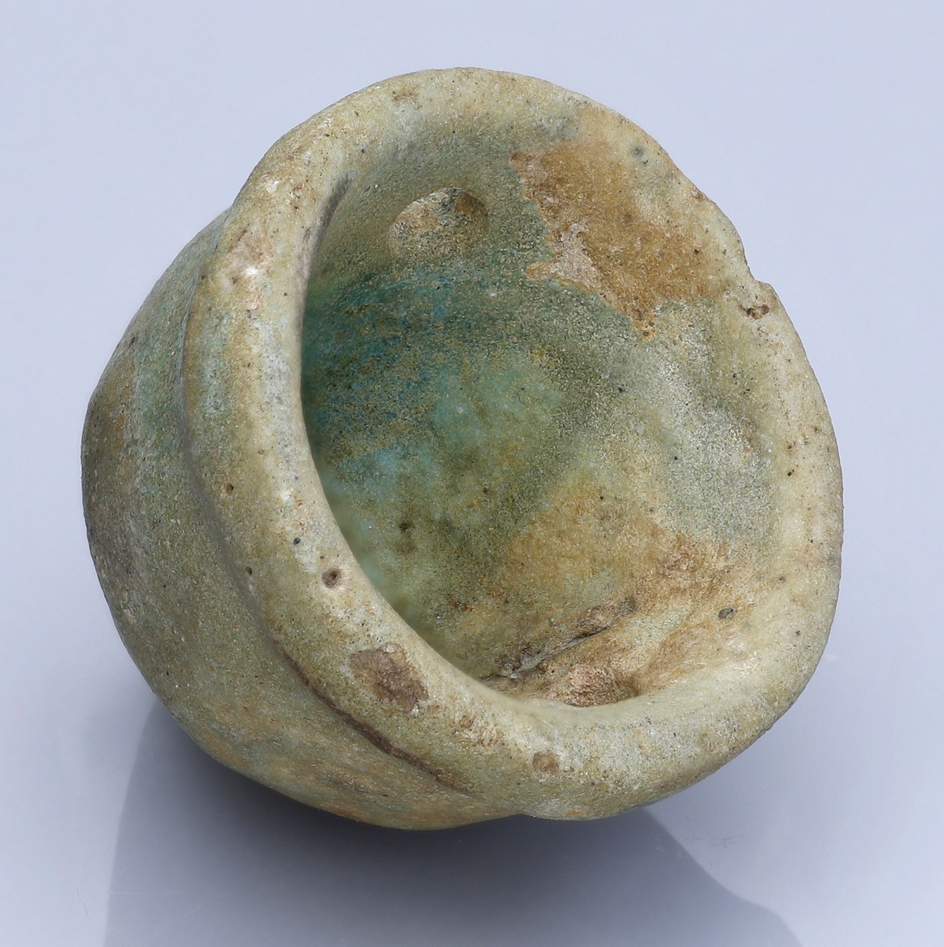 Egypt, Miscellaneous, Green faience situla in the shape of a woman's breast; pierced below t...