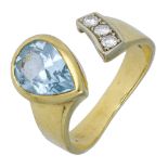 An 18ct gold blue topaz and diamond ring by Manfredi, the open terminals set with a pear-sha...
