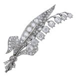 A late 19th century American lily of the valley diamond spray brooch, by J. E. Caldwell & Co...