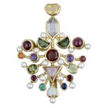 A multi gem-set brooch/pendant, set throughout with vari-cut gemstones, including aquamarine...