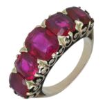 A late 19th century Burmese ruby five stone ring, the graduated cushion-cut rubies claw set...