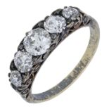 A five stone diamond ring, set with graduating old brilliant-cut diamonds, with rose-cut dia...