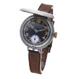 Swiss. A nickel trench watch with hinged dial cover, circa 1917. Movement: manual winding...