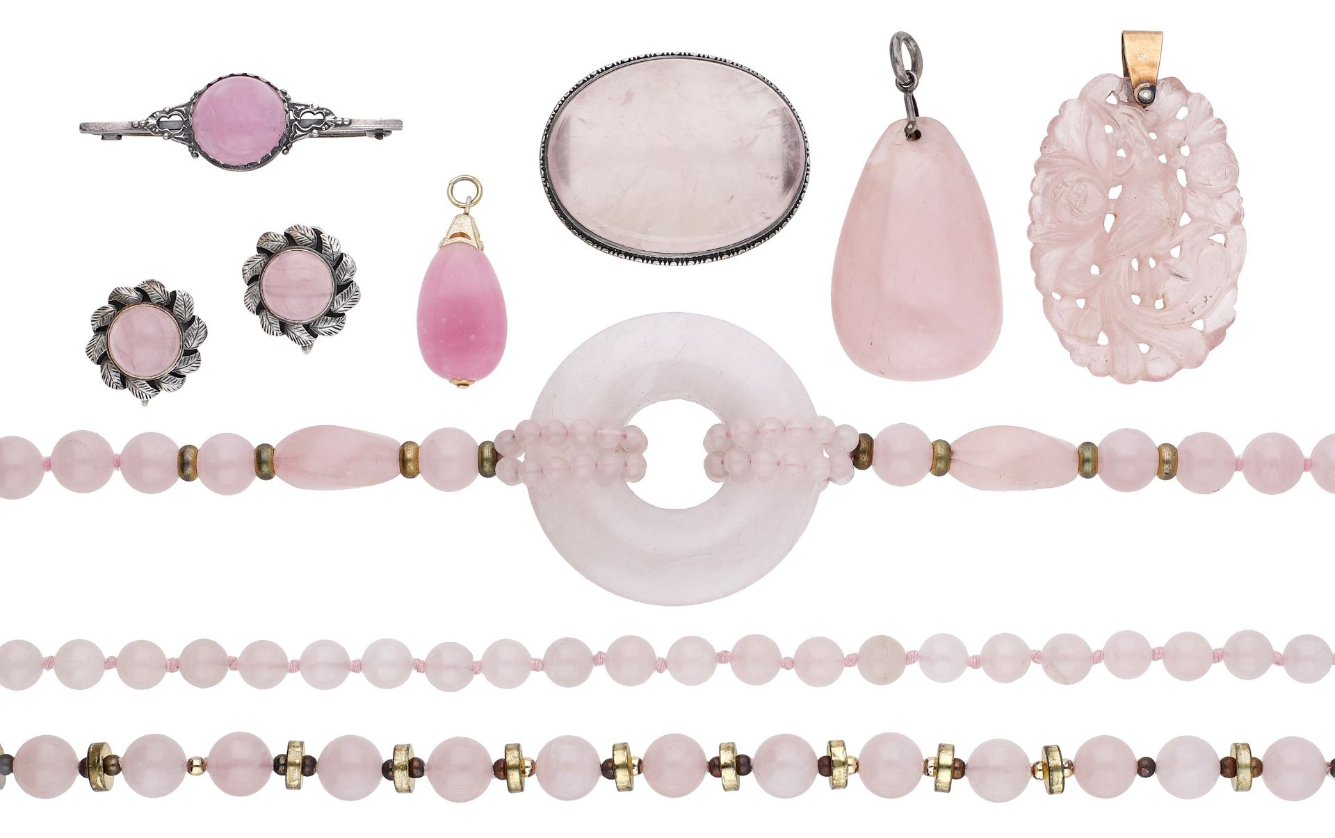 A collection of rose quartz jewellery, including bead necklaces, pendants, brooches and earr...