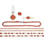 A collection of coral jewellery, comprising a coral bouton pendant, in polished mount accent...