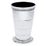 A silver collapsable beaker retailed by Mappin & Webb, of polished tapered form, by James Sa...