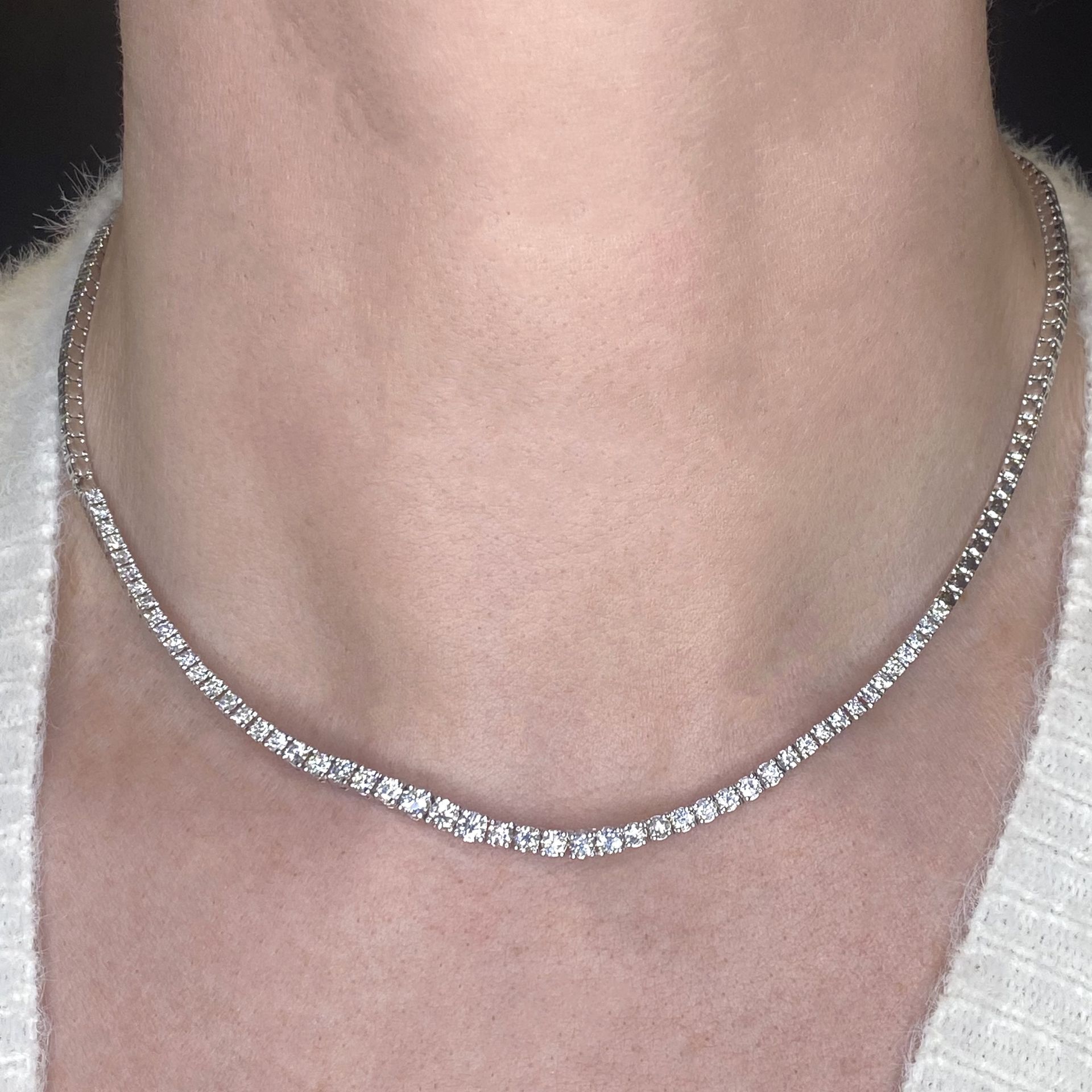 A diamond line necklace, the central section claw set with a row of slightly graduating bril... - Image 3 of 3