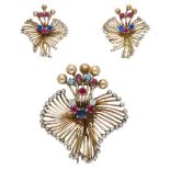 A mid 20th century gem-set suite, the brooch comprising a wirework spray with beaded termina...