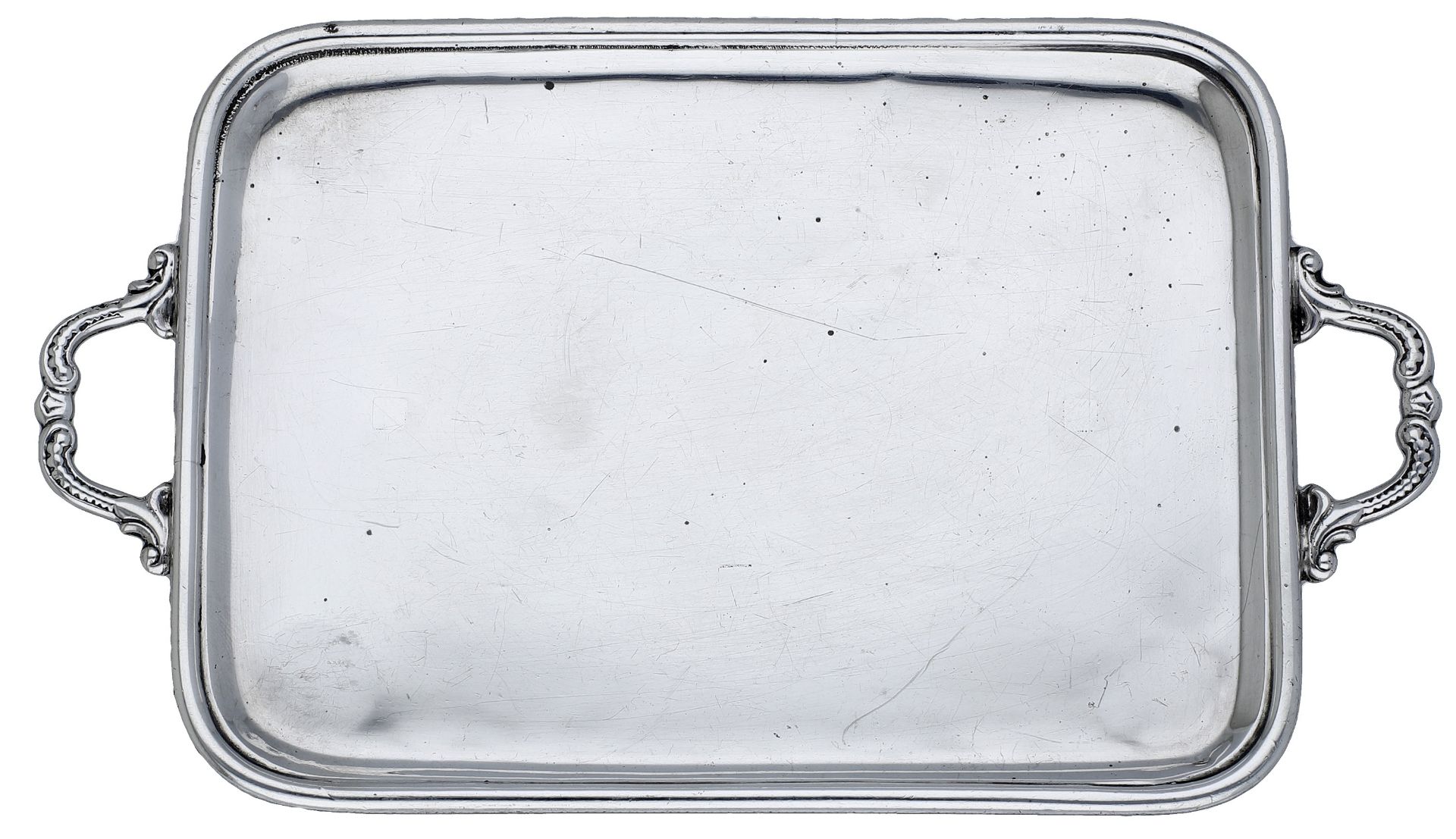 A Victorian silver miniature tray, with conjoined 'S' scroll handles and moulded border with...