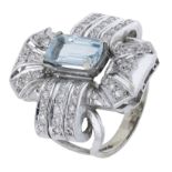 An aquamarine and diamond dress ring, the step-cut aquamarine claw-set to a pierced mount se...