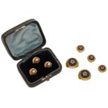 Two sets of French studs, the first comprising three gold and half pearl set studs, with loz...
