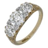 A late 19th century diamond three stone ring, the graduated old brilliant-cut diamonds with...