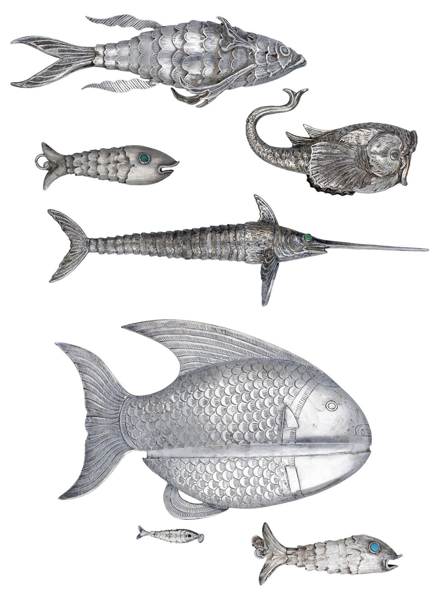 A collection of fish, including an articulated marlin and another articulated example, both...