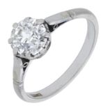 A diamond single stone ring, the old-cut diamond in eight claw setting, shank stamped '18ct'...