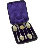 A set of four silver berry spoons with matching sifter spoon, the four tablespoons with Geor...