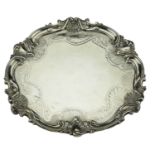 A Victorian silver salver, of good gauge, the border with boldly fashioned scallops and 'S'...